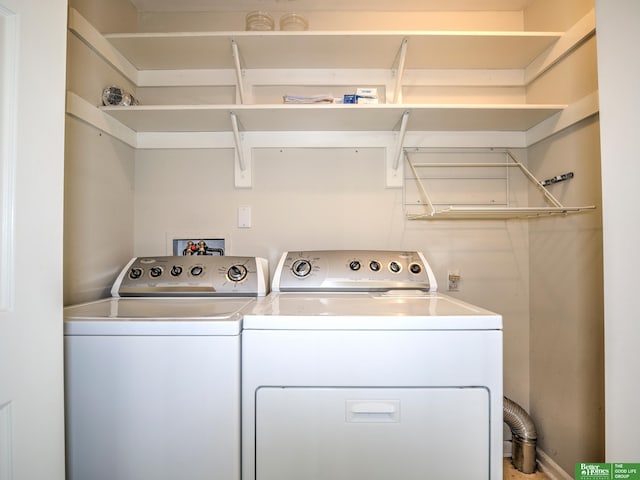 6212 Oak Hills Plz, Omaha, NE 68137 - laundry room with washing machine and dryer