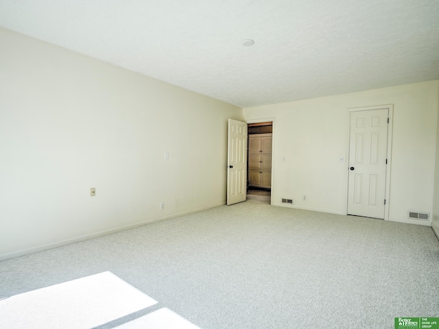 6212 Oak Hills Plz, Omaha, NE 68137 - spare room featuring light colored carpet and baseboards