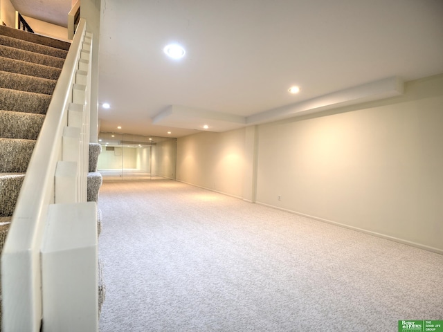 6212 Oak Hills Plz, Omaha, NE 68137 - finished below grade area featuring carpet floors, stairway, recessed lighting, and baseboards