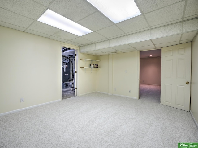 6212 Oak Hills Plz, Omaha, NE 68137 - spare room featuring carpet, a drop ceiling, and baseboards