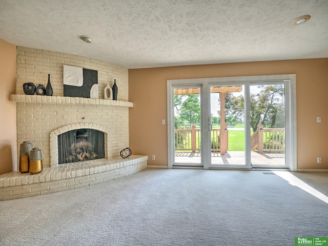 6212 Oak Hills Plz, Omaha, NE 68137 - unfurnished living room featuring carpet floors, a textured ceiling, a fireplace, and baseboards