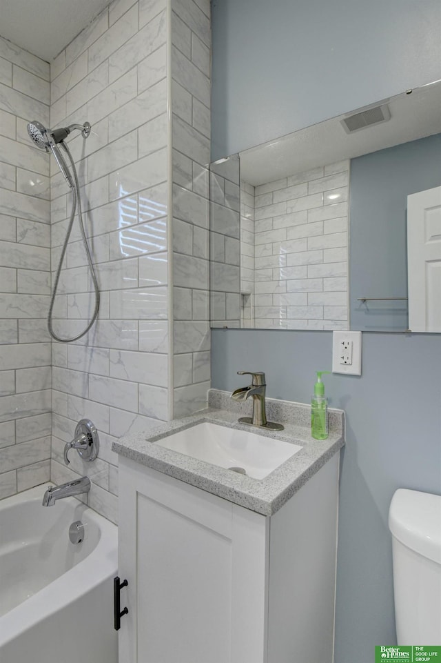 2864 Spaulding St, Omaha, NE 68111 - full bathroom featuring vanity, toilet, and bathtub / shower combination