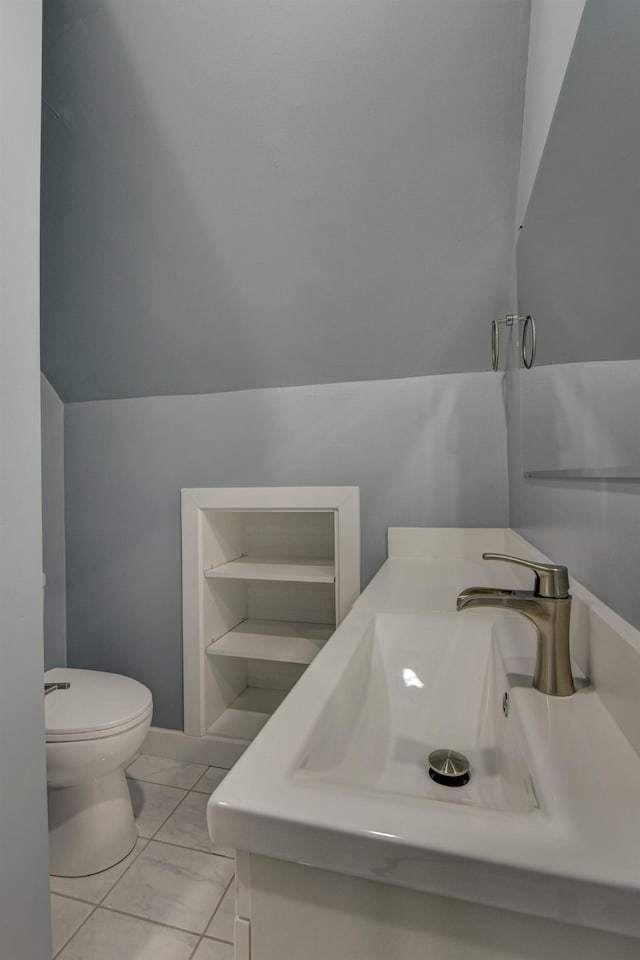 2864 Spaulding St, Omaha, NE 68111 - bathroom featuring toilet, vanity, and marble look tile flooring
