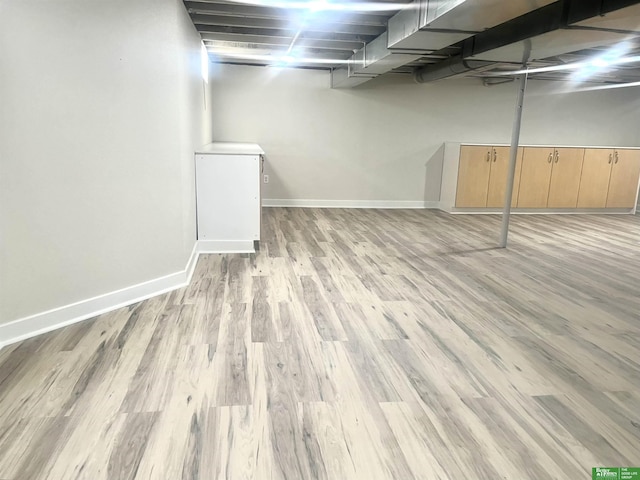2864 Spaulding St, Omaha, NE 68111 - finished basement featuring baseboards and light wood-type flooring