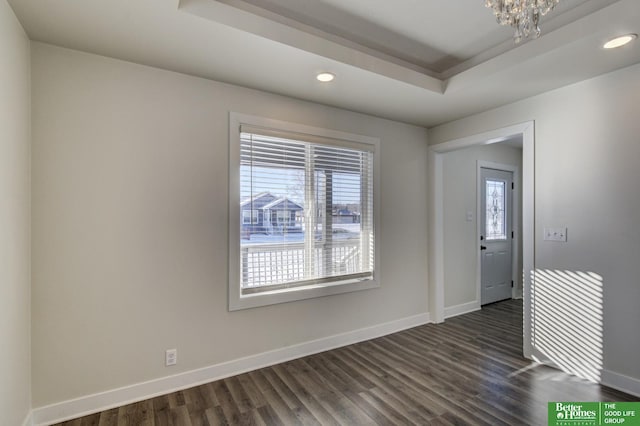 2864 Spaulding St, Omaha, NE 68111 - entrance foyer featuring a raised ceiling, baseboards, recessed lighting, dark wood finished floors, and a chandelier