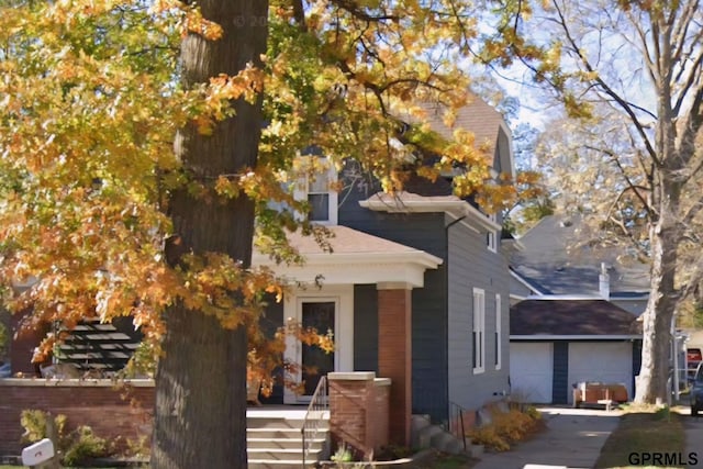 1205 N Broad St, Fremont, NE 68025 - view of front of property with concrete driveway and covered porch
