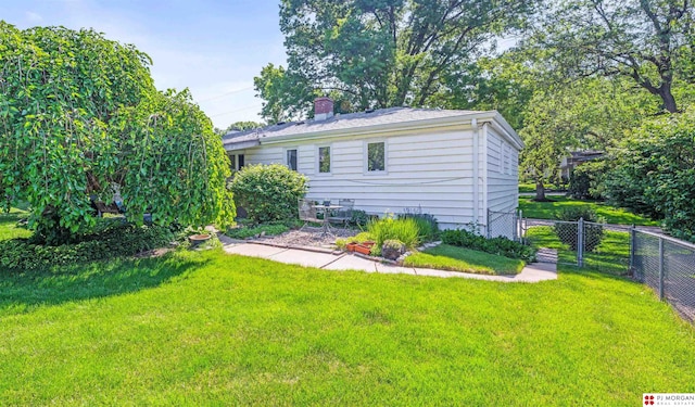 1439 S 123rd St, Omaha, NE 68144 - back of property with a chimney