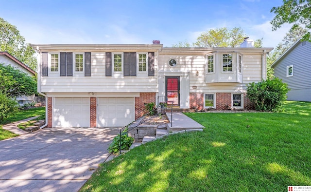 1439 S 123rd St, Omaha, NE 68144 - split foyer home with driveway, a garage, a front lawn, a chimney, and brick siding