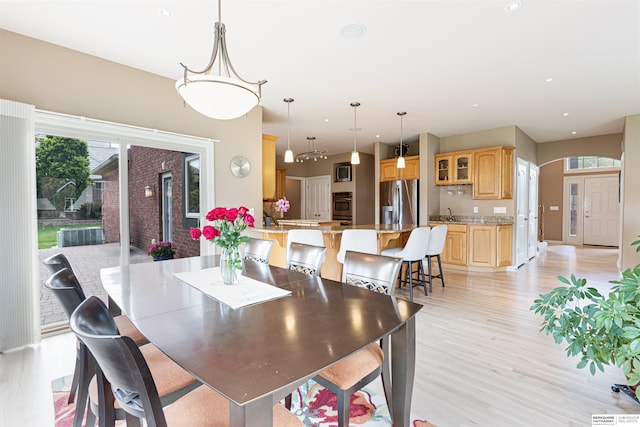 13303 Cuming St, Omaha, NE 68154 - dining space featuring light wood-style flooring and recessed lighting