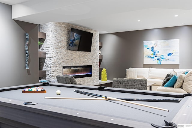 13303 Cuming St, Omaha, NE 68154 - recreation room featuring a stone fireplace and recessed lighting