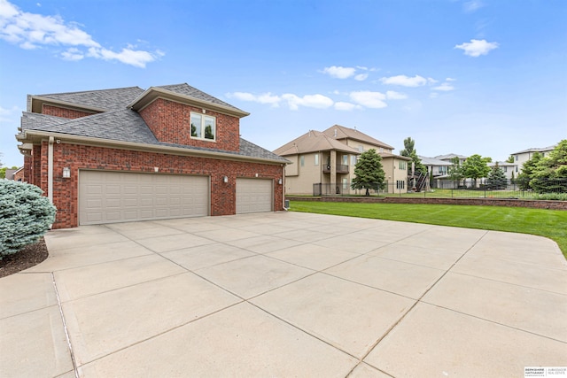 13303 Cuming St, Omaha, NE 68154 - traditional home with brick siding, driveway, roof with shingles, and a residential view