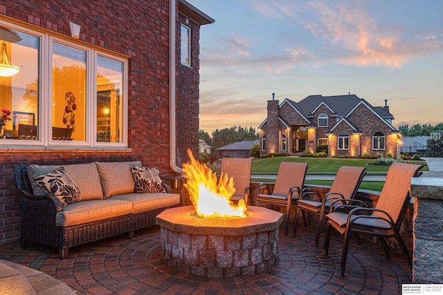 13303 Cuming St, Omaha, NE 68154 - view of patio featuring an outdoor living space with a fire pit