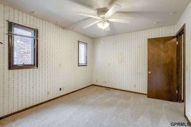 5617 S 93rd St, Omaha, NE 68127 - unfurnished bedroom featuring carpet floors and a ceiling fan