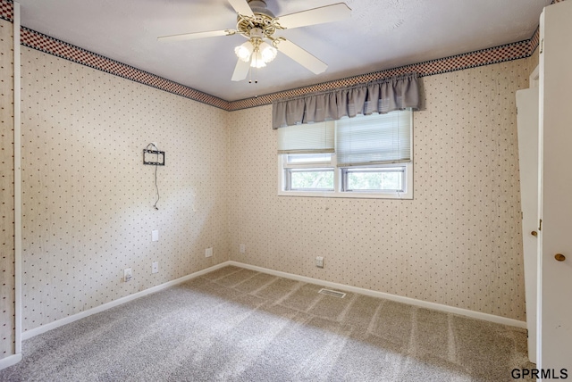 5617 S 93rd St, Omaha, NE 68127 - carpeted empty room featuring a ceiling fan and baseboards