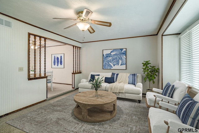 5617 S 93rd St, Omaha, NE 68127 - carpeted living room featuring crown molding, ceiling fan, and baseboards