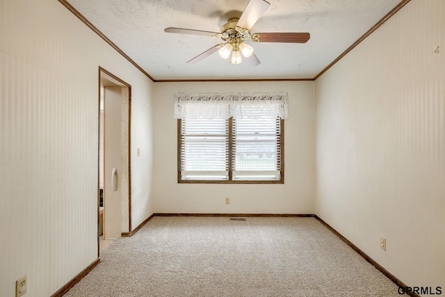 5617 S 93rd St, Omaha, NE 68127 - unfurnished room with crown molding, light colored carpet, a ceiling fan, baseboards, and a textured ceiling