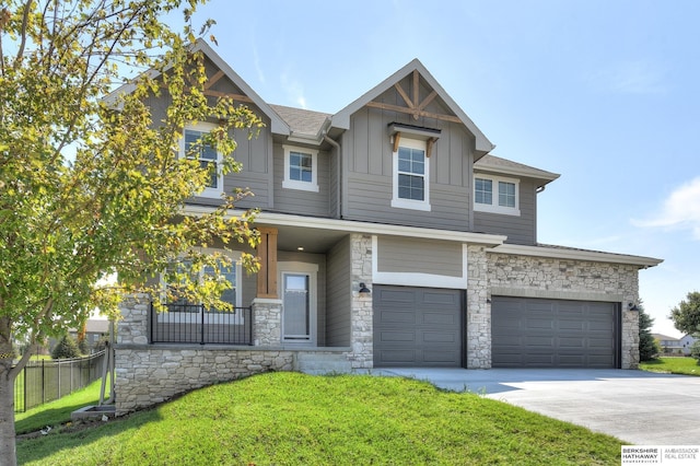19920 Tyler St, Omaha, NE 68135 - craftsman-style home with stone siding, board and batten siding, an attached garage, and concrete driveway