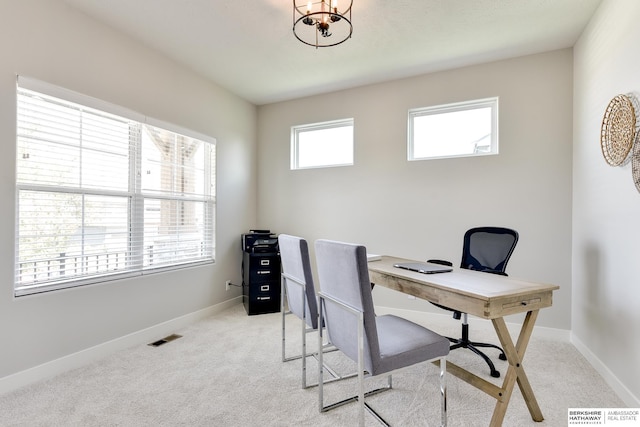 19920 Tyler St, Omaha, NE 68135 - office area with light colored carpet, baseboards, and a chandelier
