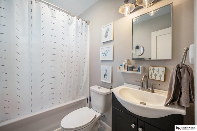 6021 Frederick St, Omaha, NE 68106 - bathroom with vanity, toilet, and shower / bath combo with shower curtain