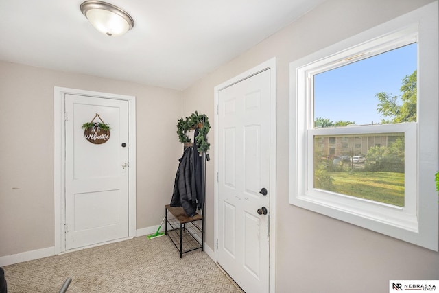 6021 Frederick St, Omaha, NE 68106 - entrance foyer featuring healthy amount of natural light and baseboards