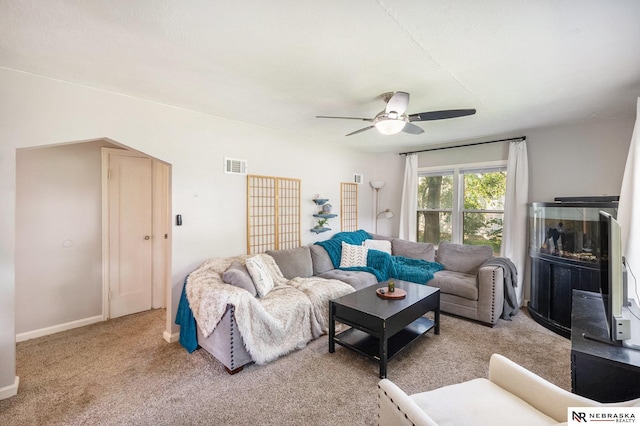 6021 Frederick St, Omaha, NE 68106 - living area featuring carpet floors, a ceiling fan, and baseboards