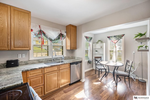 6021 Frederick St, Omaha, NE 68106 - kitchen featuring dishwasher, a sink, light wood finished floors, baseboards, and light stone countertops