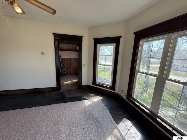 608 E Fillmore Ave, Dewitt, NE 68341 - unfurnished room featuring healthy amount of natural light, baseboards, and a ceiling fan