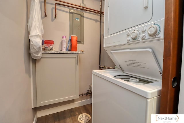 4115 N 45th Street Ct, Lincoln, NE 68504 - laundry room with stacked washing machine and dryer, wood finished floors, and electric panel