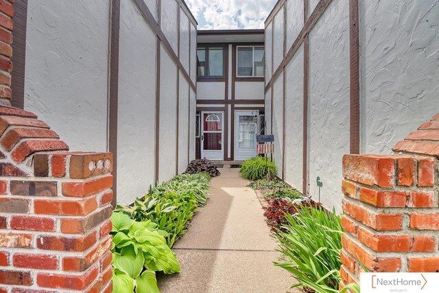 4115 N 45th Street Ct, Lincoln, NE 68504 - doorway to property with stucco siding