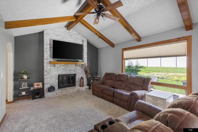 918 N 150th St, Omaha, NE 68154 - living area featuring a textured ceiling, carpet, a ceiling fan, a fireplace, and baseboards