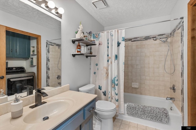 918 N 150th St, Omaha, NE 68154 - bathroom with washer / dryer, a textured ceiling, vanity, toilet, and shower / bath combo