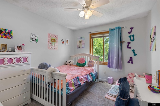 918 N 150th St, Omaha, NE 68154 - carpeted bedroom featuring a textured ceiling and ceiling fan