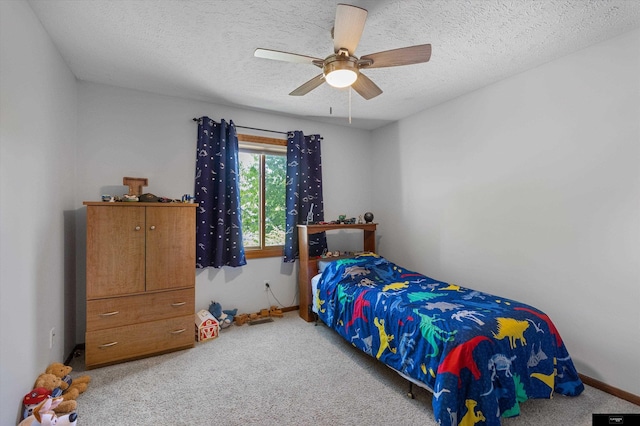 918 N 150th St, Omaha, NE 68154 - carpeted bedroom with ceiling fan, a textured ceiling, and baseboards