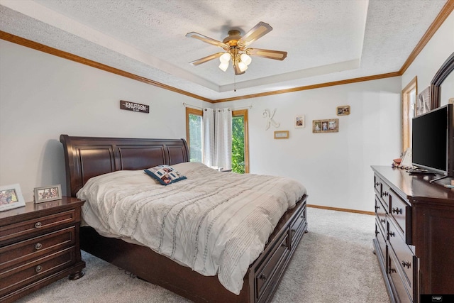 918 N 150th St, Omaha, NE 68154 - bedroom with a raised ceiling, light colored carpet, a textured ceiling, baseboards, and ornamental molding