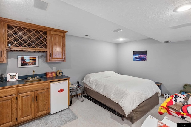 918 N 150th St, Omaha, NE 68154 - bedroom featuring bar with sink and recessed lighting