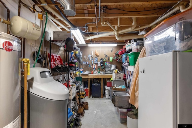 918 N 150th St, Omaha, NE 68154 - unfinished below grade area with freestanding refrigerator, gas water heater, a water softener system, and a workshop area