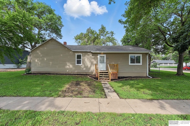 209 S Vine St, Mead, NE 68041 - view of front facade featuring a front lawn and a chimney