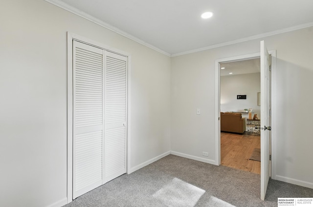 209 S Vine St, Mead, NE 68041 - unfurnished bedroom featuring crown molding, carpet, recessed lighting, a closet, and baseboards