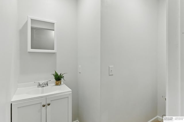 209 S Vine St, Mead, NE 68041 - bathroom with vanity and baseboards