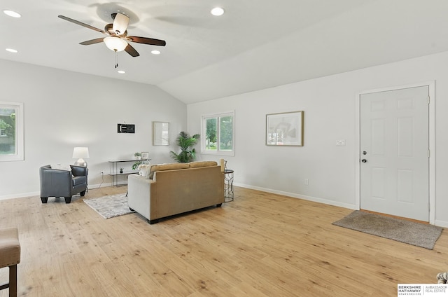 209 S Vine St, Mead, NE 68041 - living room featuring ceiling fan, light wood finished floors, vaulted ceiling, baseboards, and recessed lighting