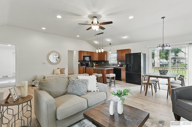 209 S Vine St, Mead, NE 68041 - living room with vaulted ceiling, a ceiling fan, light wood-style floors, and recessed lighting