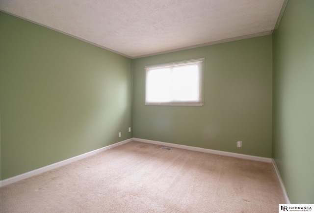 13220 Carpenter St, Omaha, NE 68138 - carpeted spare room featuring baseboards and a textured ceiling
