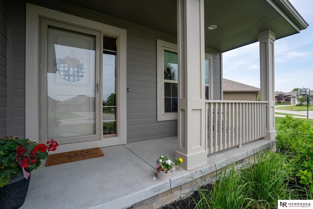 21313 Castlerock Ln, Gretna, NE 68028 - doorway to property with a porch