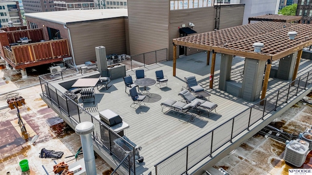 1024 Dodge St Unit 402, Omaha, NE 68102 - deck with central air condition unit and outdoor dining area