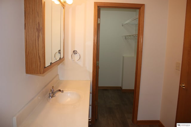 120 W Deer Ln, Plattsmouth, NE 68048 - bathroom featuring vanity and wood finished floors