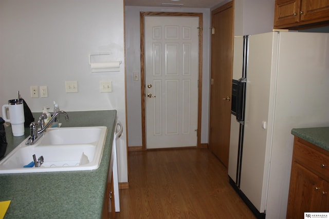 120 W Deer Ln, Plattsmouth, NE 68048 - bathroom with a sink, wood finished floors, and baseboards