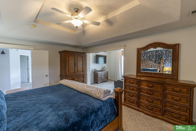 3902 Fox Ridge Dr, Bellevue, NE 68123 - bedroom with a raised ceiling, light colored carpet, and ceiling fan