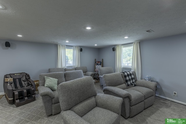 3902 Fox Ridge Dr, Bellevue, NE 68123 - carpeted living area with recessed lighting, a textured ceiling, and baseboards