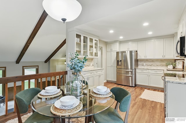 2615 Jack Pine St, Bellevue, NE 68123 - dining area with light wood-style flooring, recessed lighting, and beamed ceiling