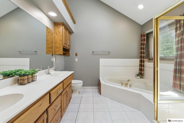 10428 Monroe St, Omaha, NE 68127 - bathroom with lofted ceiling, a bath, double vanity, toilet, and baseboards